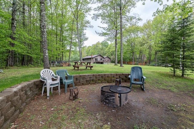 view of patio featuring an outdoor fire pit