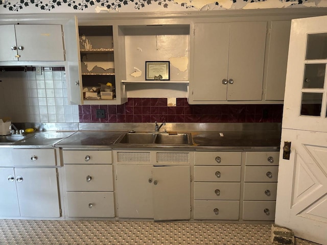 5628 Sturgeon Bay Rd, New Franken, WI 54229 - kitchen with stainless steel countertops, open shelves, decorative backsplash, and electric cooktop