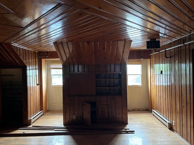 view of horse barn with a baseboard heating unit