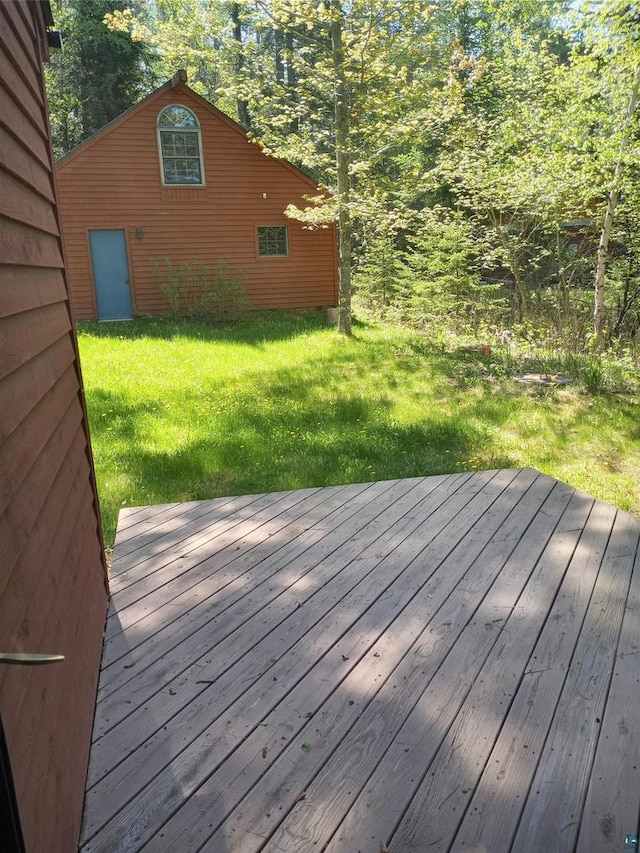 deck featuring a yard