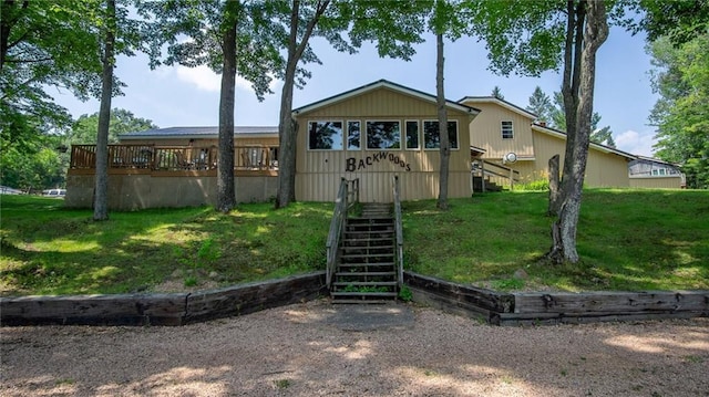 14549 Plummer Rd, Weyerhaeuser, WI 54895 - back of house featuring a lawn