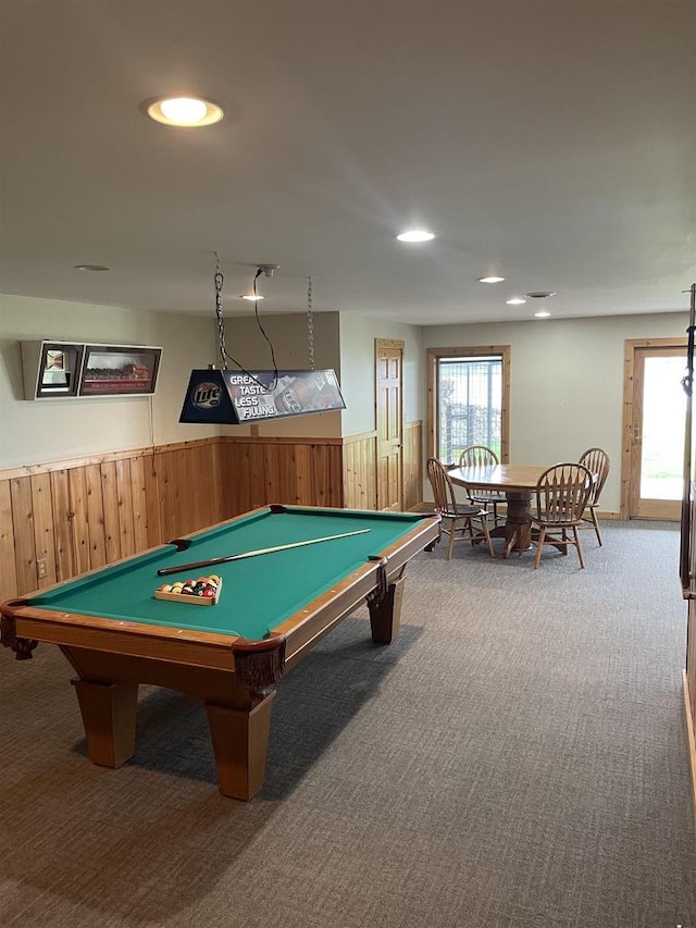 game room featuring carpet flooring, wood walls, and billiards