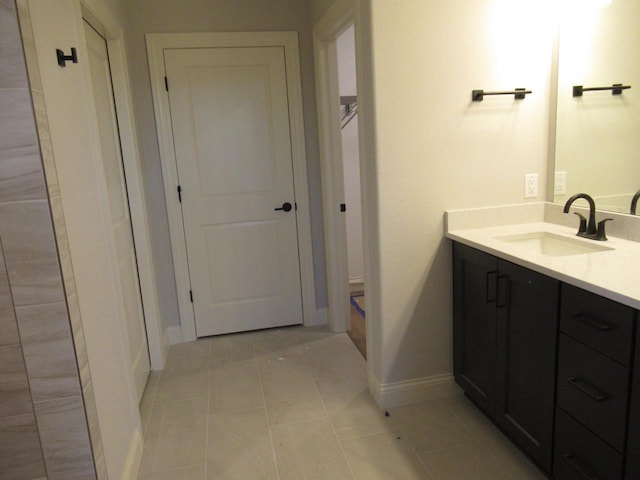 bathroom featuring vanity and tile patterned floors