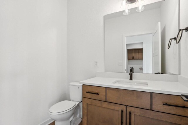 485 Chapman Farm Blvd, Mukwonago, WI 53149 - bathroom featuring toilet and vanity