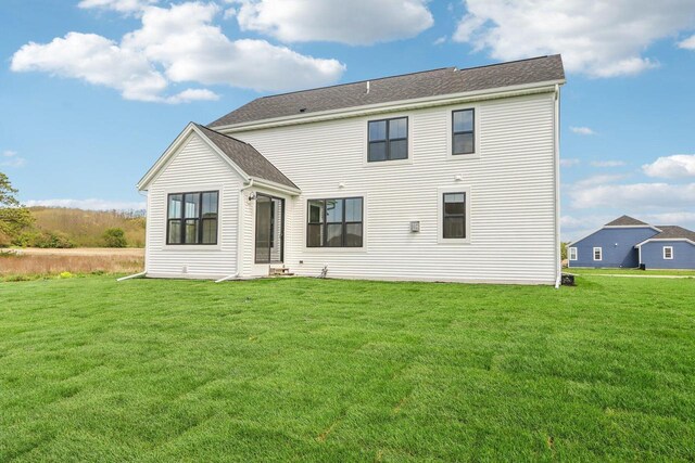 485 Chapman Farm Blvd, Mukwonago, WI 53149 - rear view of house with a yard