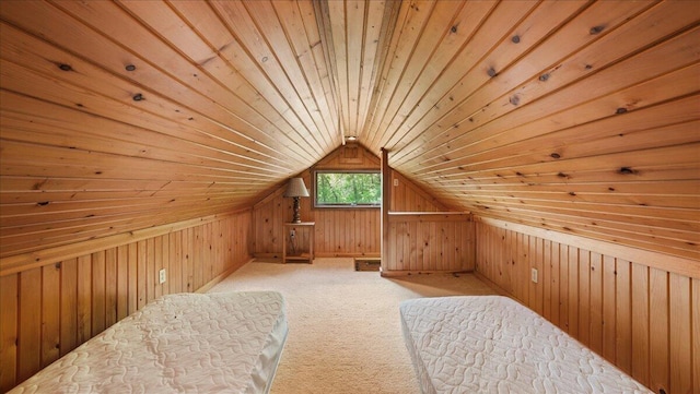 additional living space with wood walls, light colored carpet, wood ceiling, and vaulted ceiling