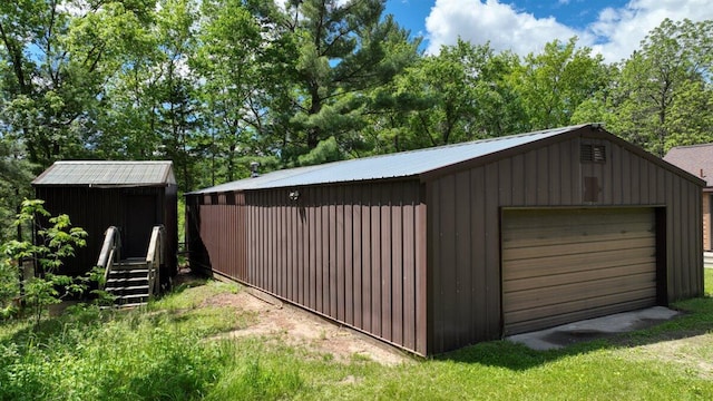 view of outdoor structure with a garage