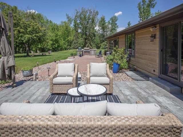 view of patio / terrace with an outdoor living space and a wooden deck