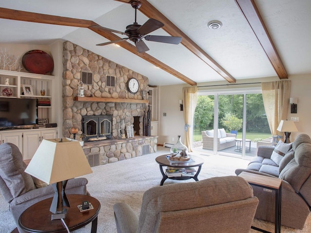 living room with a fireplace, vaulted ceiling with beams, light colored carpet, and ceiling fan