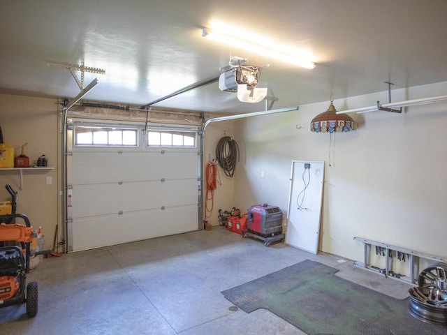 garage featuring a garage door opener