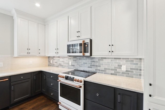 kitchen featuring white cabinets, electric stove, dark wood-style flooring, backsplash, and recessed lighting