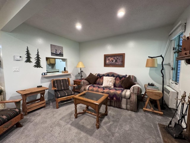 carpeted living room with a textured ceiling