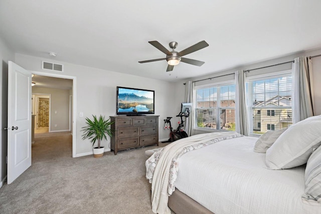 bedroom with light carpet and ceiling fan