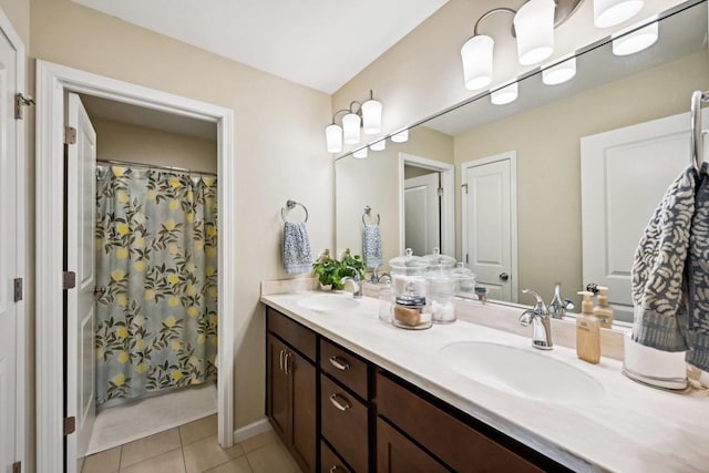 bathroom featuring tile patterned flooring, vanity, and a chandelier