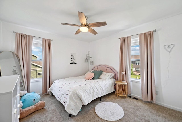 bedroom featuring ceiling fan and carpet floors