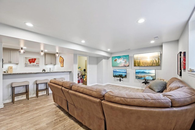 living room with light hardwood / wood-style floors