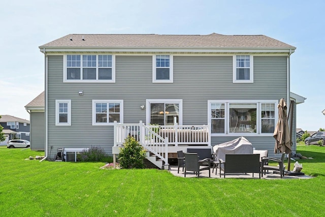 rear view of property featuring a lawn, central AC unit, a patio area, and a deck