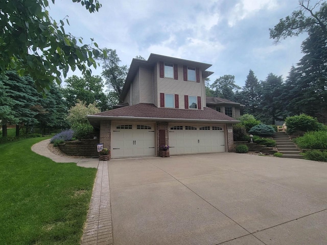 exterior space featuring a garage and a yard