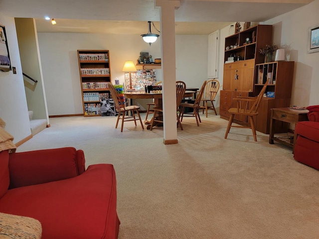 living room featuring light carpet