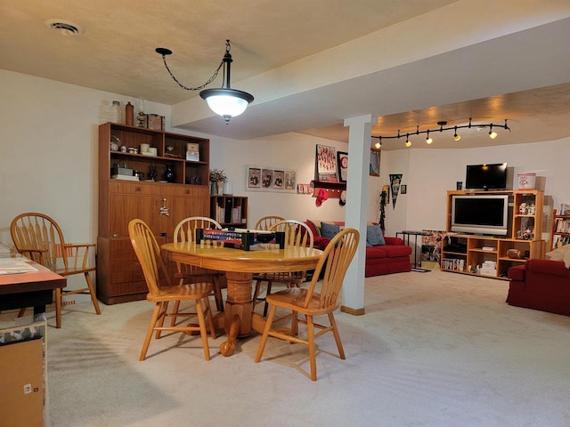 view of carpeted dining room