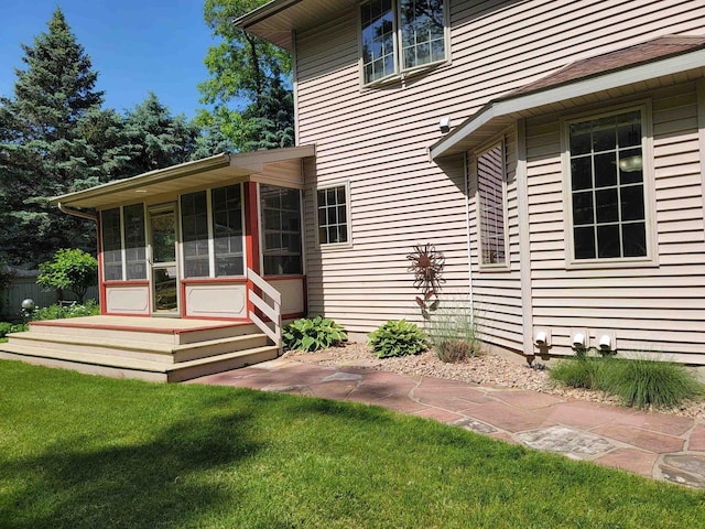 exterior space with a lawn