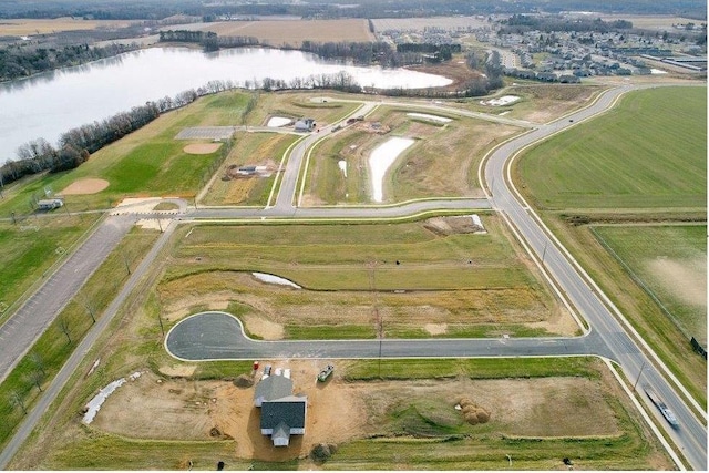 bird's eye view with a rural view and a water view