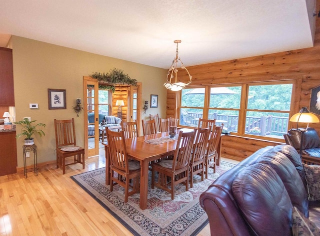 dining room with light hardwood / wood-style floors