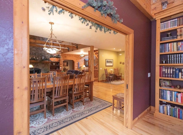 dining area with hardwood / wood-style floors