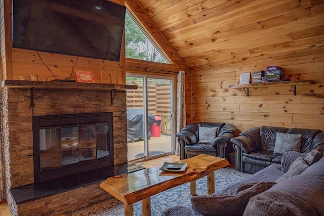 living room with wood walls, wood-type flooring, lofted ceiling, a fireplace, and wood ceiling