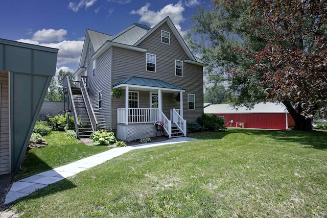 view of front of house with a front lawn and a porch