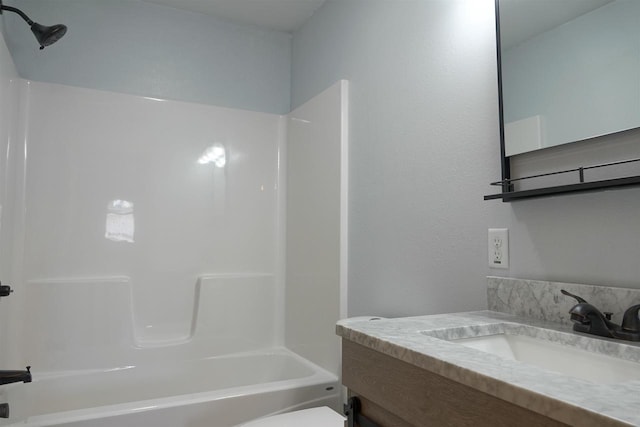 full bathroom with vanity, toilet, and tub / shower combination