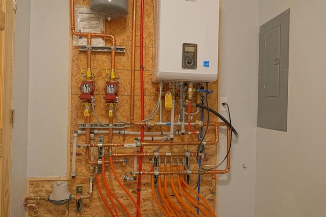 utility room featuring tankless water heater and electric panel