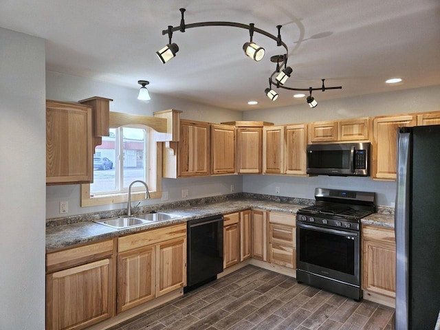 kitchen featuring appliances with stainless steel finishes, dark hardwood / wood-style floors, and sink