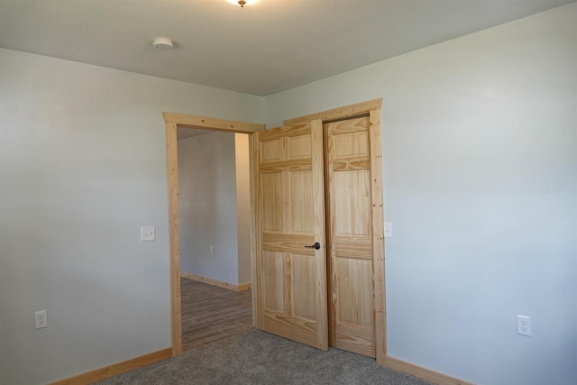 unfurnished bedroom featuring wood-type flooring