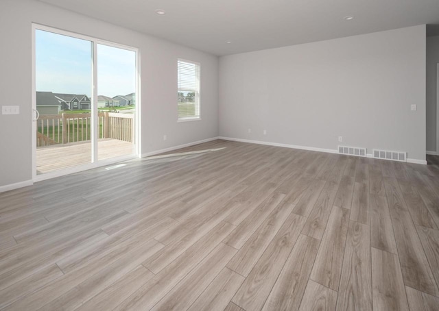 empty room featuring light hardwood / wood-style floors