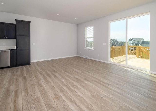 unfurnished living room with light hardwood / wood-style floors