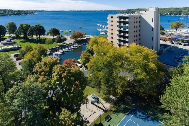 birds eye view of property with a water view