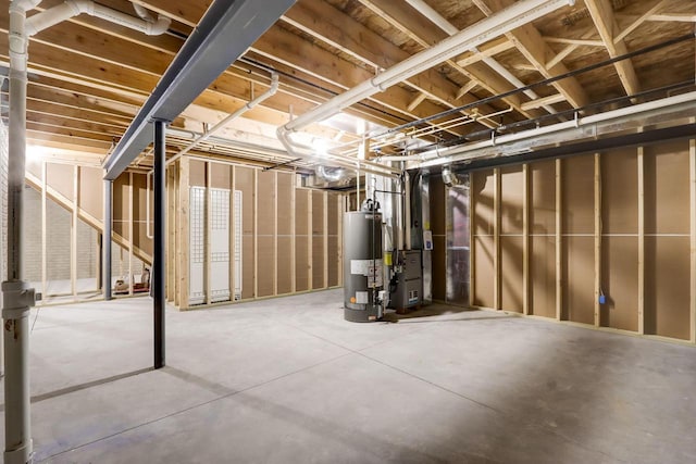 basement featuring gas water heater