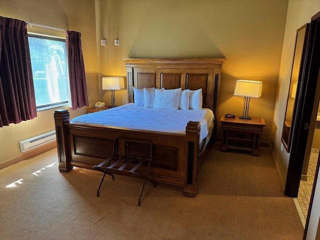 bedroom featuring light carpet and a baseboard radiator