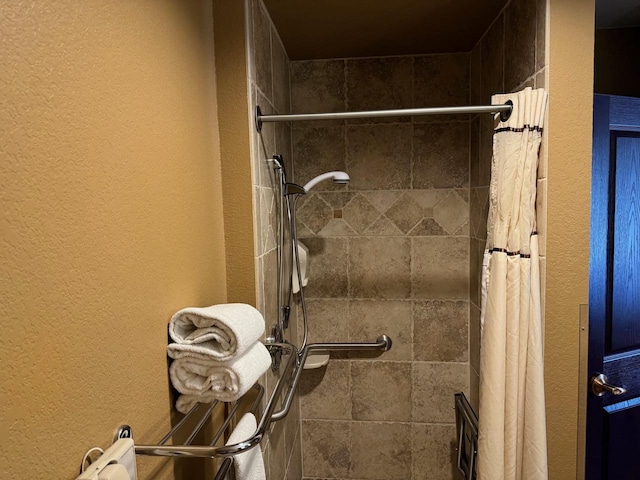 bathroom with a shower with curtain