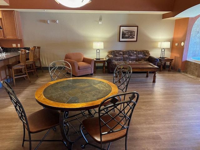 dining area with light hardwood / wood-style flooring