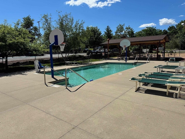 view of pool featuring a gazebo and a patio area