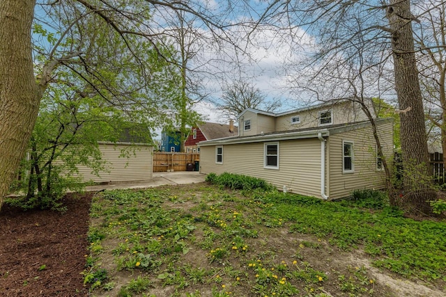 rear view of house featuring a patio