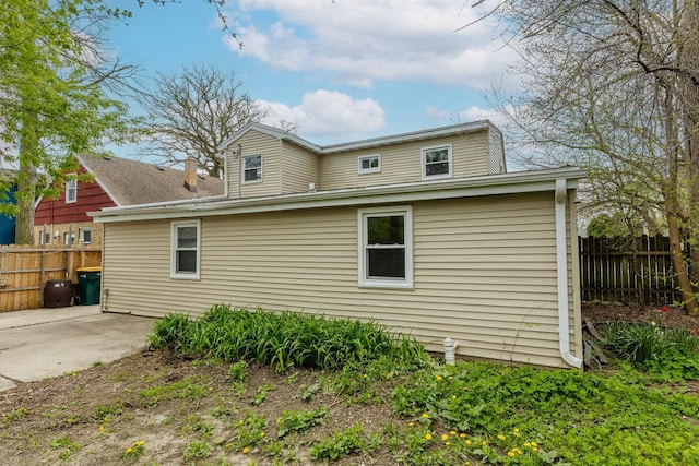 back of house with a patio area