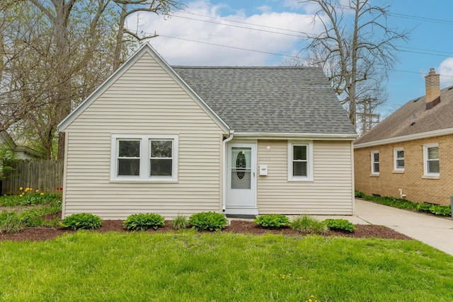 view of front of home with a front lawn