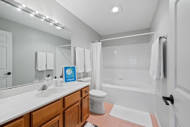 bathroom featuring tile patterned floors, vanity, and toilet