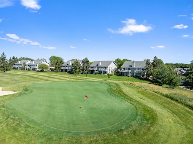 view of home's community featuring a yard