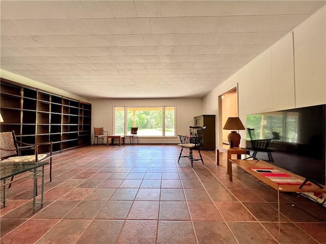 living area featuring tile patterned flooring