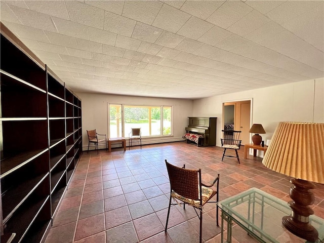 unfurnished living room featuring tile patterned flooring