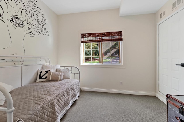 bedroom featuring carpet